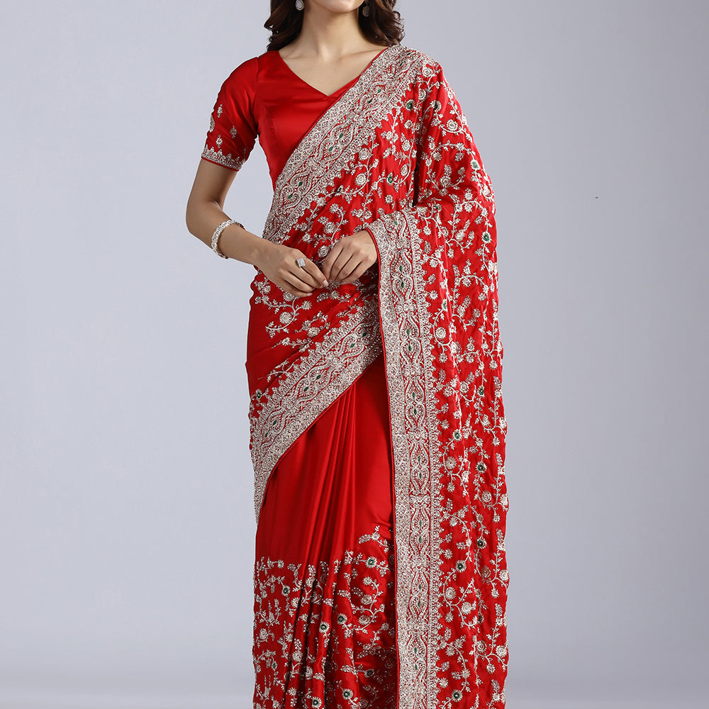 Crepe Saree Adorned with Shimmering Swarovski Crystals and Traditional Zari Artistry