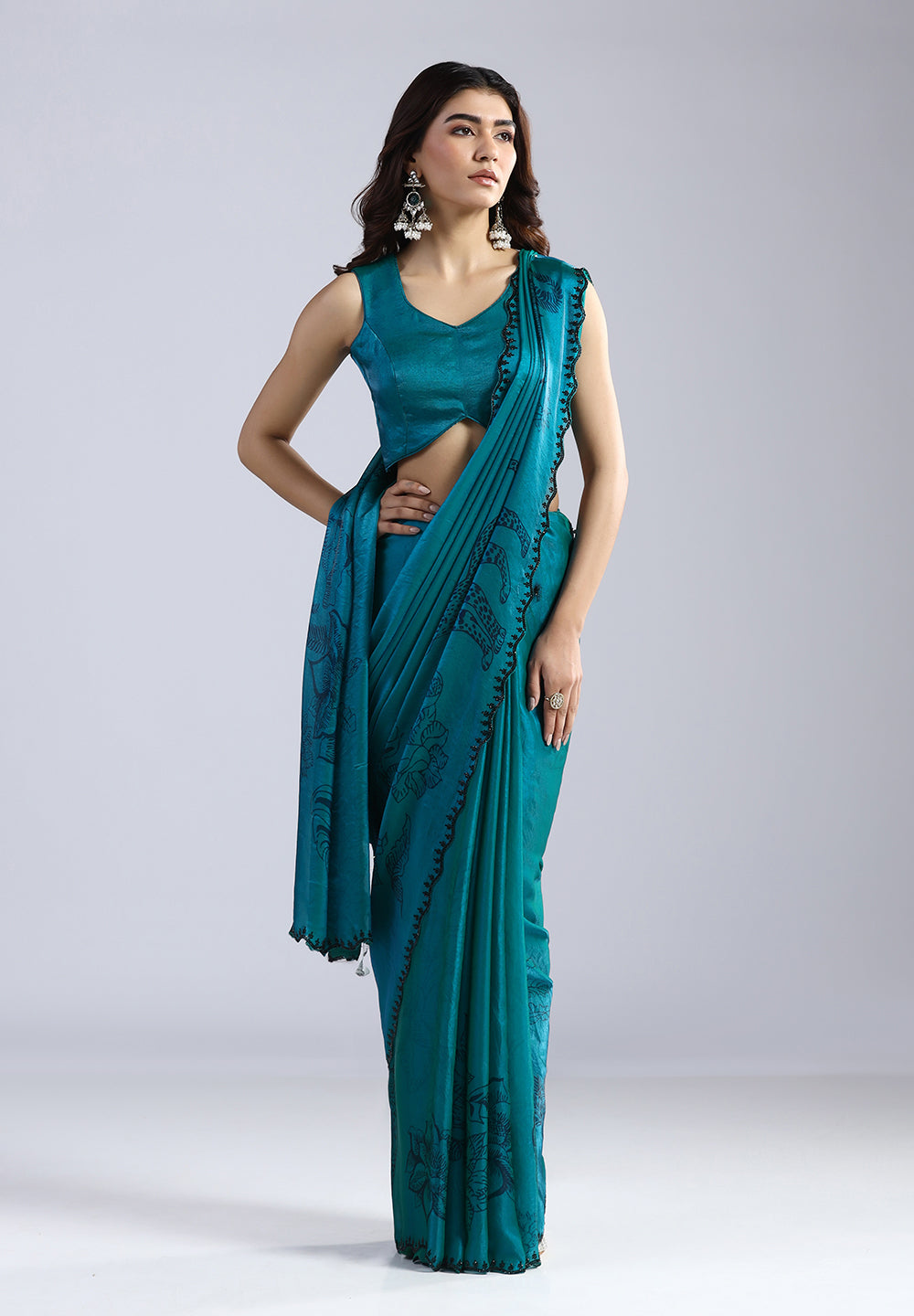 Teal Radiance Hand-Printed Organza Saree with Scalloped Beadwork