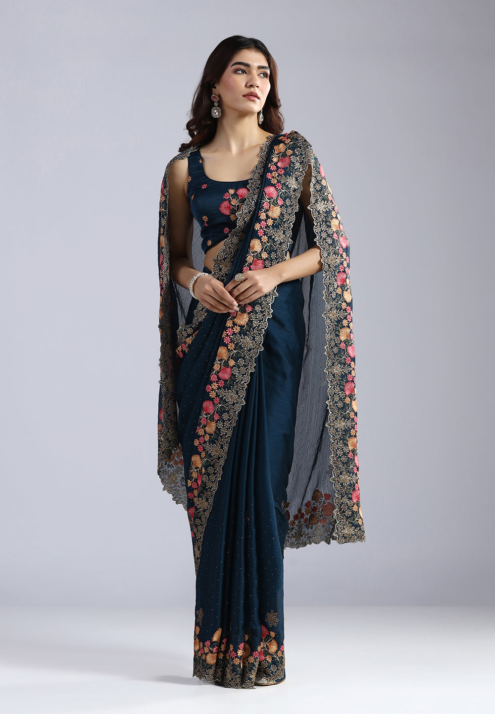 Sophisticated Crepe Saree with Swarovski Accents and Designer Threadwork Border