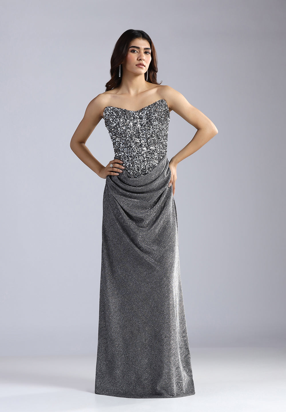 Steal the spotlight in our Midnight Shimmer Sequin Gown