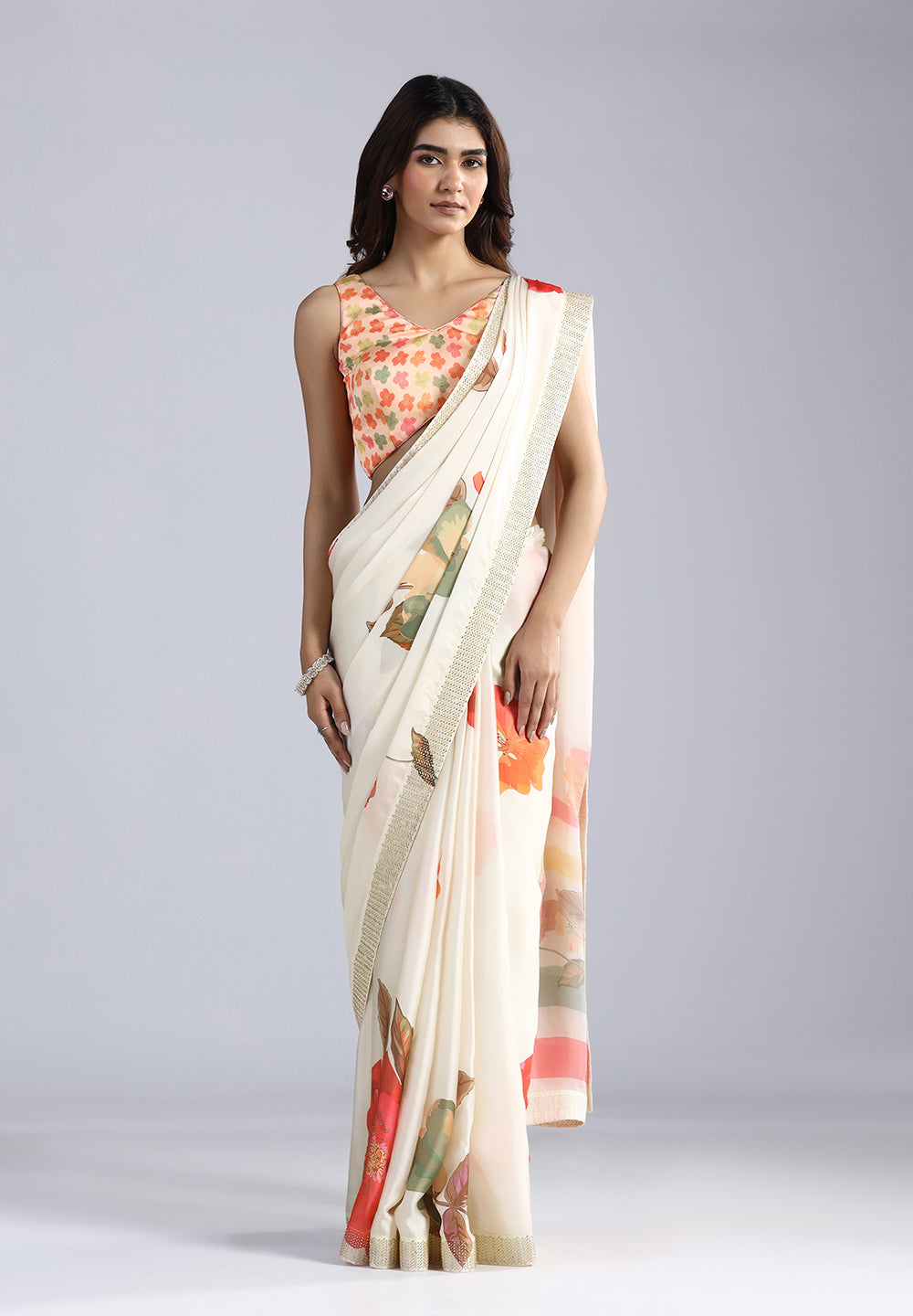 Crepe Saree with Designer Print, Swarovski, and Zarkan Artistry