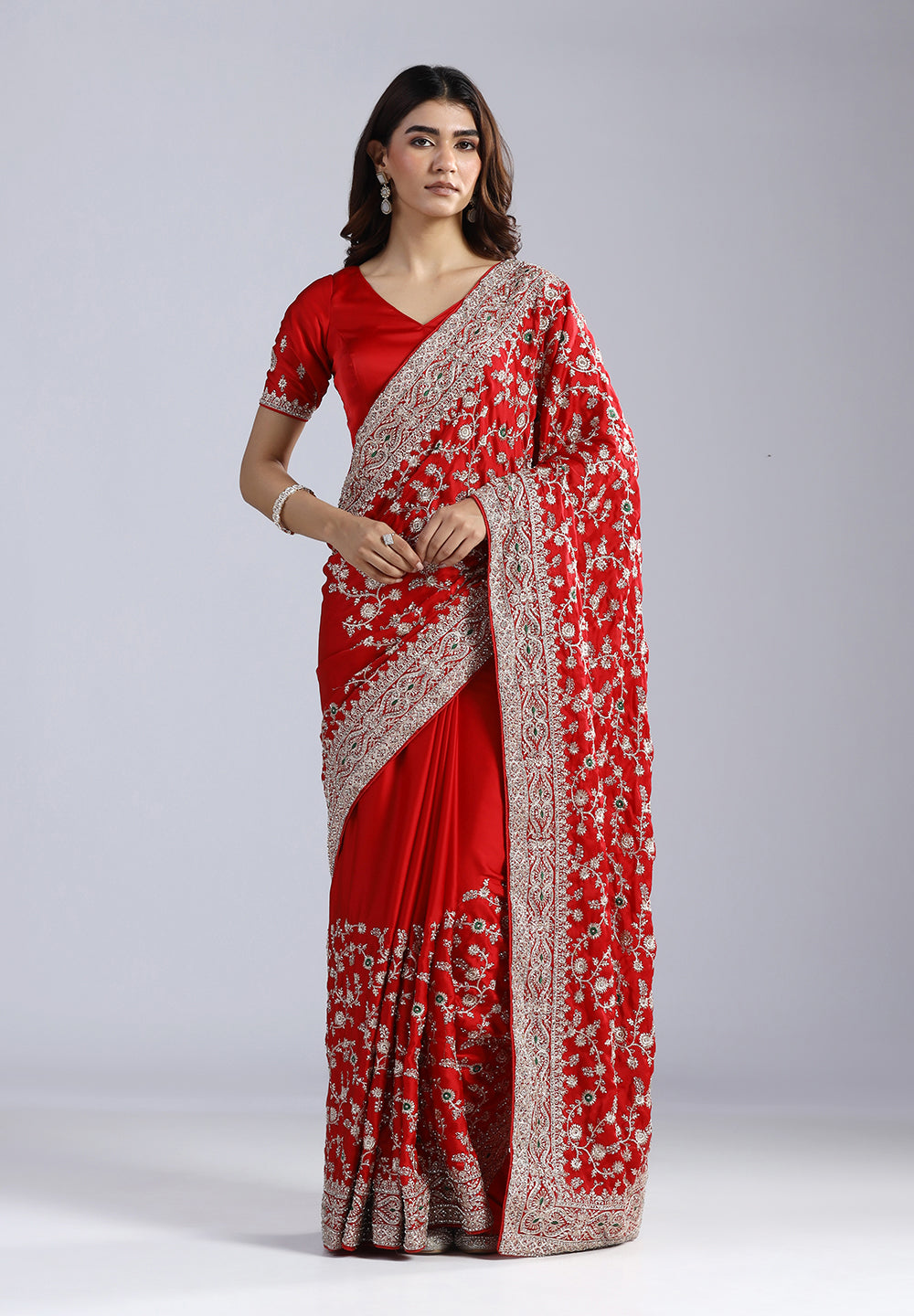 Crepe Saree Adorned with Shimmering Swarovski Crystals and Traditional Zari Artistry