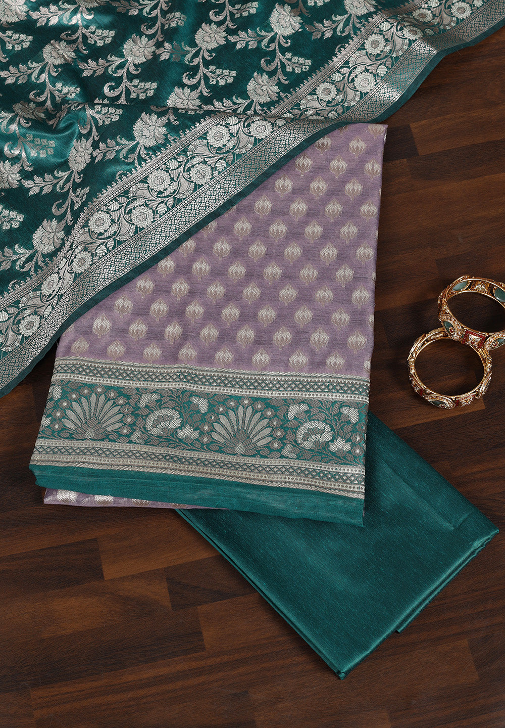 Elegant Fabric Suit with Contrast Border & Intricate Zari Work