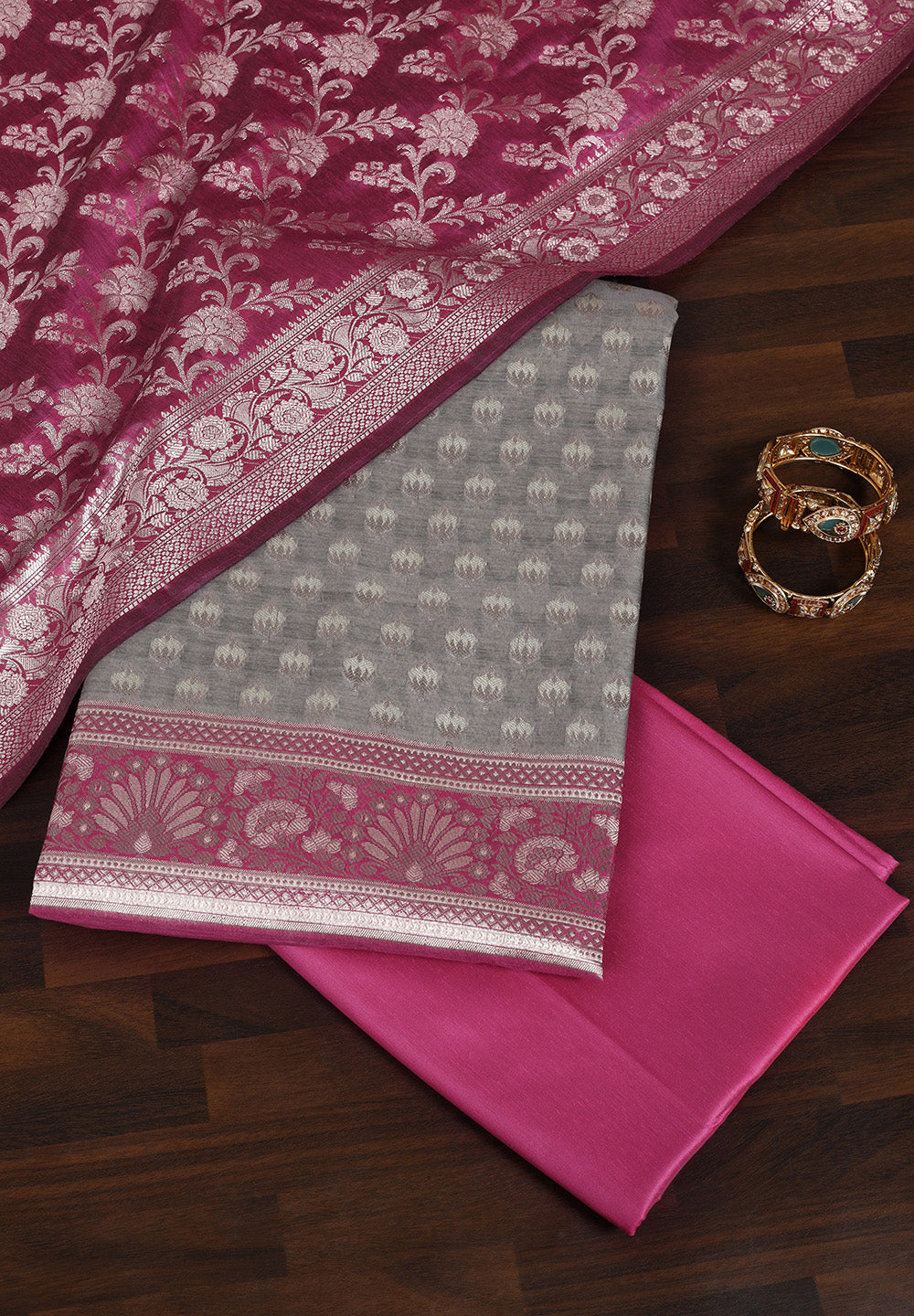 Elegant Fabric Suit with Contrast Border & Intricate Zari Work