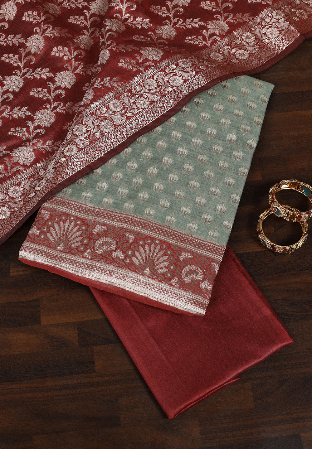 Elegant Fabric Suit with Contrast Border & Intricate Zari Work