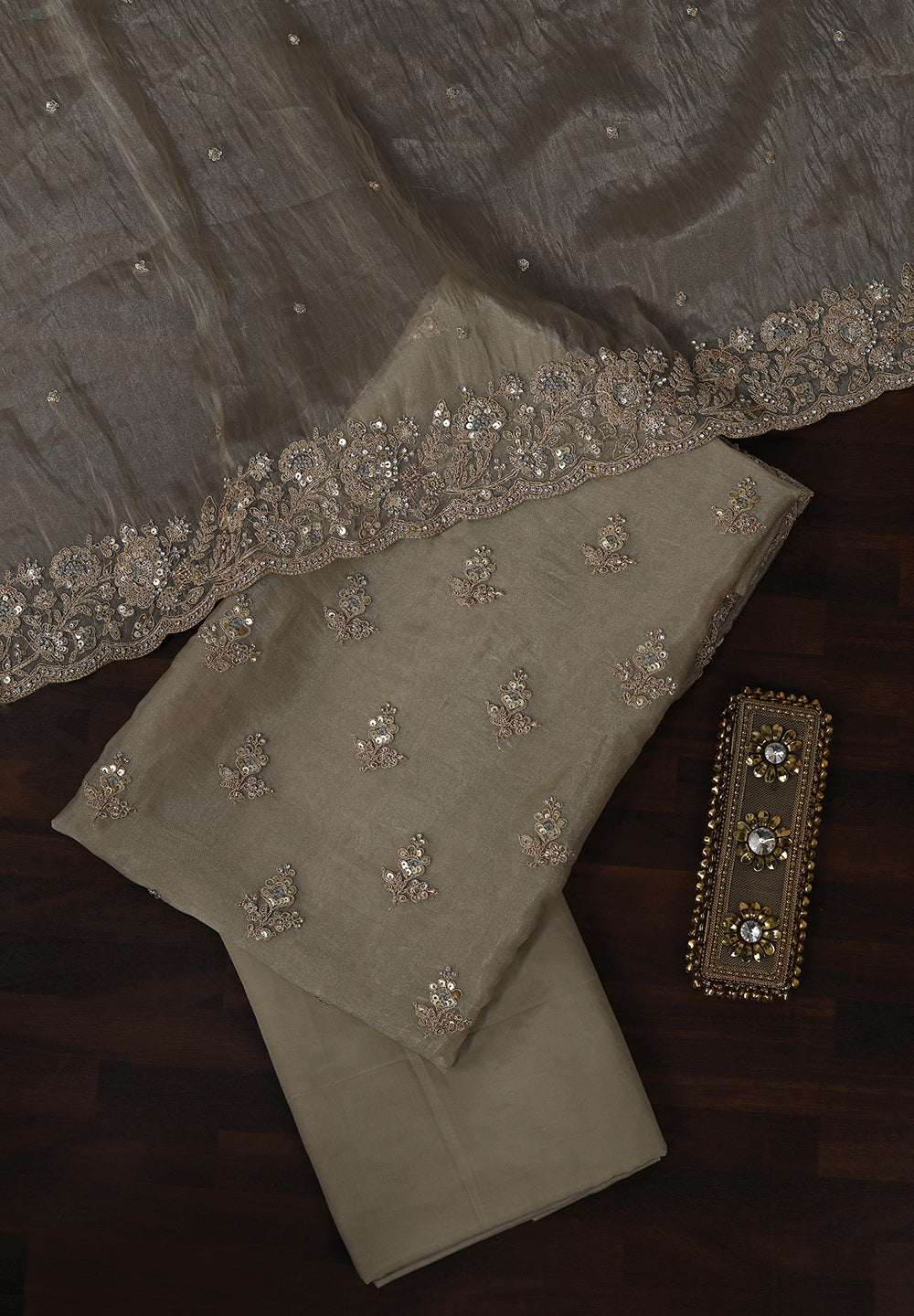 Tissue Suit Adorned with Aari & Pearl Embellishments