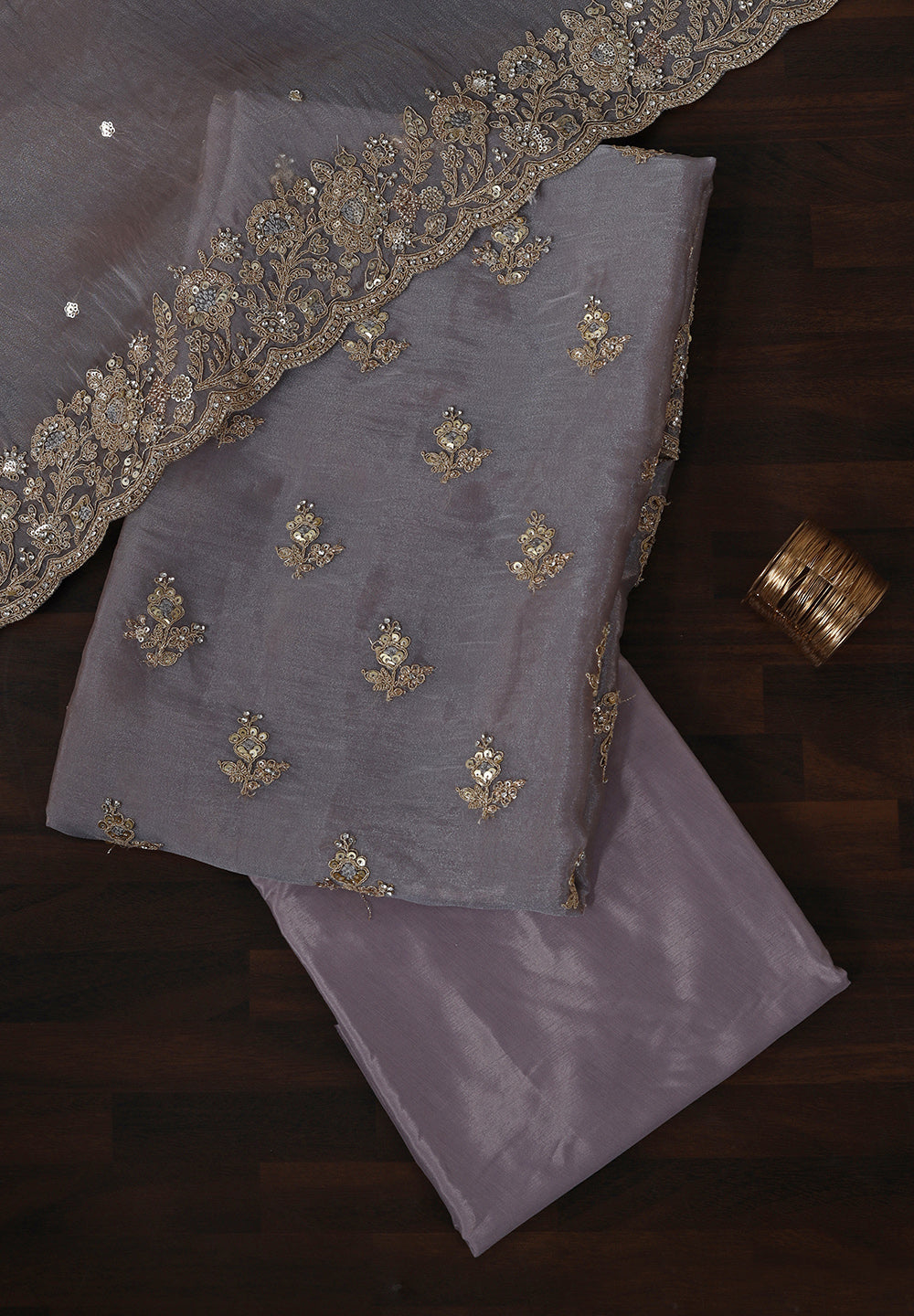 Tissue Suit Adorned with Aari & Pearl Embellishments