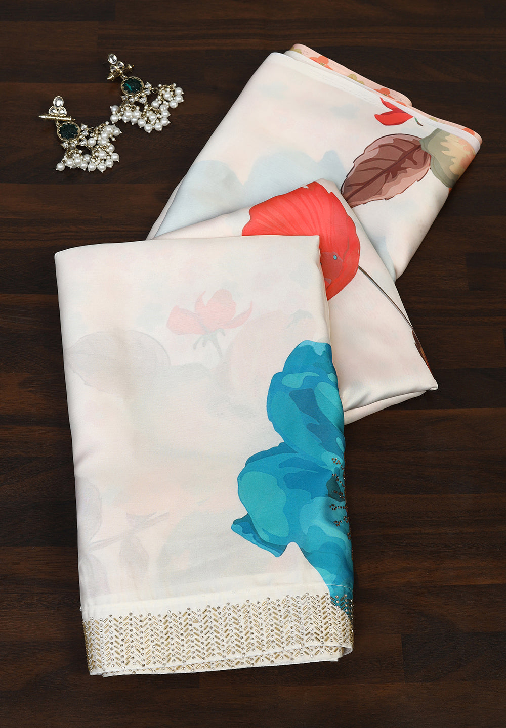 Crepe Saree with Designer Print, Swarovski, and Zarkan Artistry