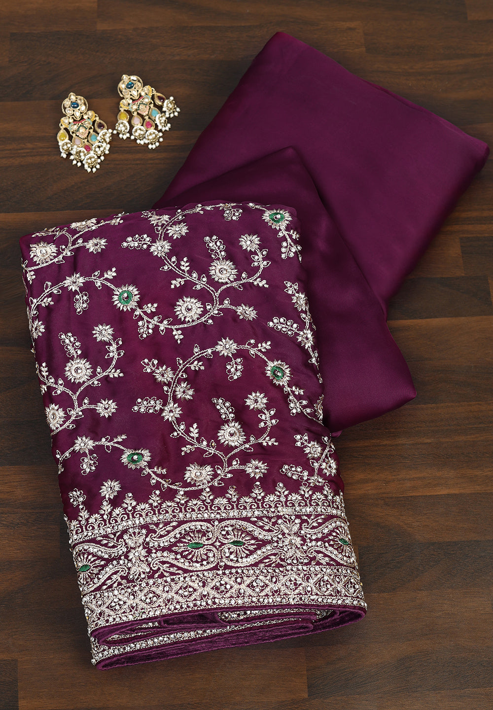 Crepe Saree Adorned with Shimmering Swarovski Crystals and Traditional Zari Artistry