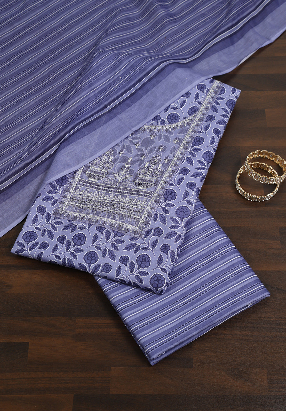 "Floral Grace: Printed Cotton Suit with Delicate Thread Neck Patch"