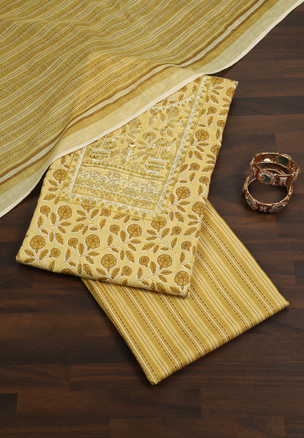 "Floral Grace: Printed Cotton Suit with Delicate Thread Neck Patch"